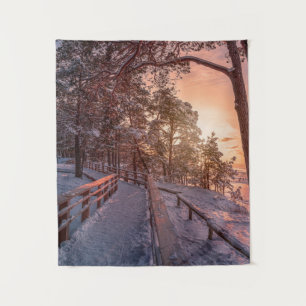 Winter sunset in pine forest near sea tapestry
