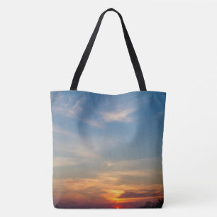 Winter sunset sky tote bag