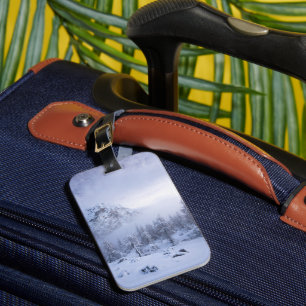 Winter wonderland, fog, spruce forest and mountain luggage tag