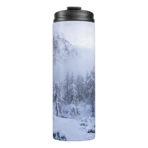 Winter wonderland, fog, spruce forest and mountain thermal tumbler