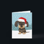 Wirehaired Dachshund Santa Teckel Dog Christmas Holiday Card<br><div class="desc">This adorable Christmas card is perfect for wirehaired dachshund lovers! The hand-drawn image of the festive and loveable teckel wearing a Santa hat captures the playful spirit of the holidays. Customise the inside with your own thoughtful sentiments to help spread joy to everyone on your list this season. Great for...</div>
