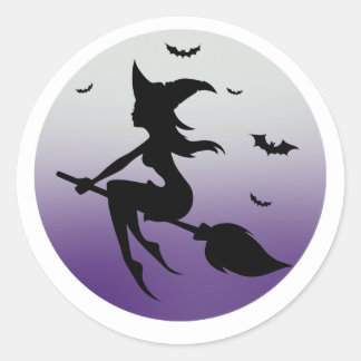 Witch silhouette in purple moon classic round sticker