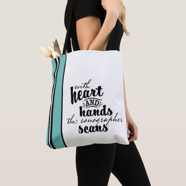 With Heart and Hands the Sonographer Scans Tote Bag (Close Up)