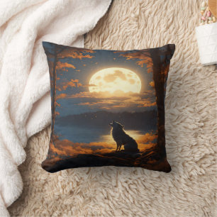 Wolf Howling Beneath Glowing Full Moon at Dusk Cushion
