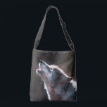 Wolf Howling Lone Wolf Crossbody Bag<br><div class="desc">Wolf howling,  if you love wolves or are a lone wolf this is for you.  Take this wild wolf home with you and live on the wild side.</div>