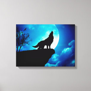 Wolf in silhouette howling to the full moon canvas print