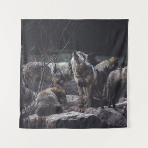 WOLF PACK ON ROCK FORMATION TAPESTRY