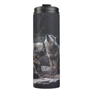 WOLF PACK ON ROCK FORMATION THERMAL TUMBLER