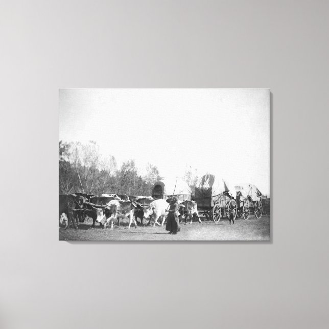 Woman and Boy with Bullwhackers in Ox Train Canvas Print (Front)