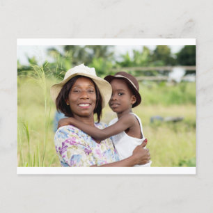 woman and child in the bush. postcard
