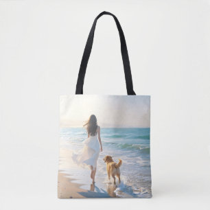 Woman and Dog Walking on the Beach at Sunset Tote Bag