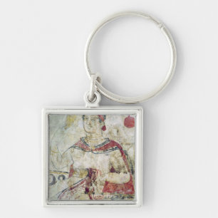 Woman at her toilet, detail from a funerary key ring