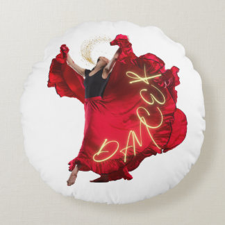 Woman dancing in red dress round cushion
