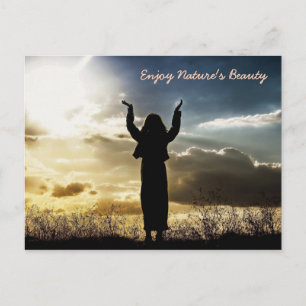 Woman enjoying sunset Postcard