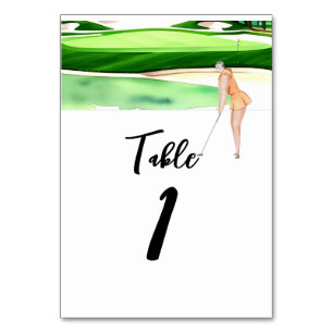 Woman Golfer is golfing on green  table number