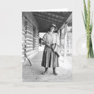 Woman holding a rifle on a porch card