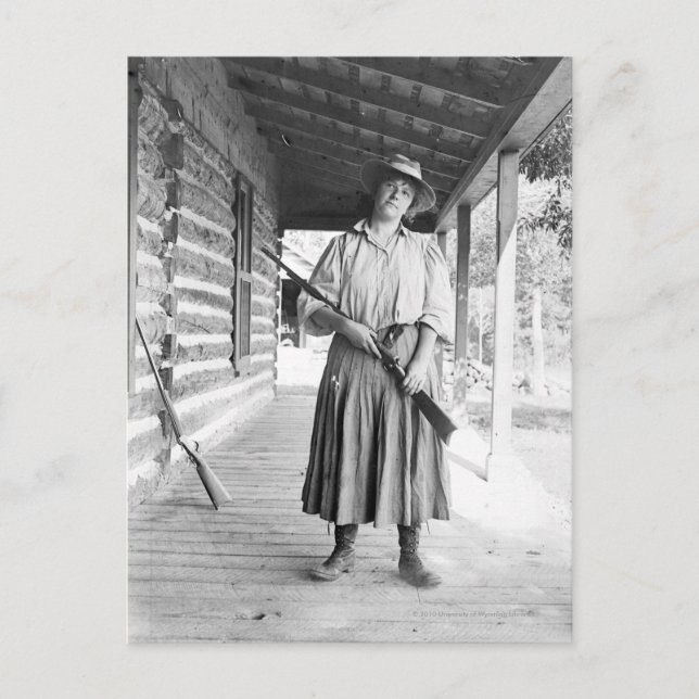 Woman holding a rifle on a porch postcard (Front)