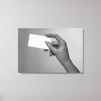 Woman Holding Card Canvas Print