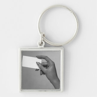 Woman Holding Card Key Ring