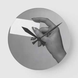 Woman Holding Card Round Clock