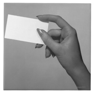 Woman Holding Card Tile