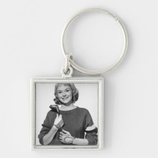 Woman Holding Golf Club Key Ring