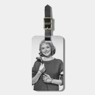 Woman Holding Golf Club Luggage Tag