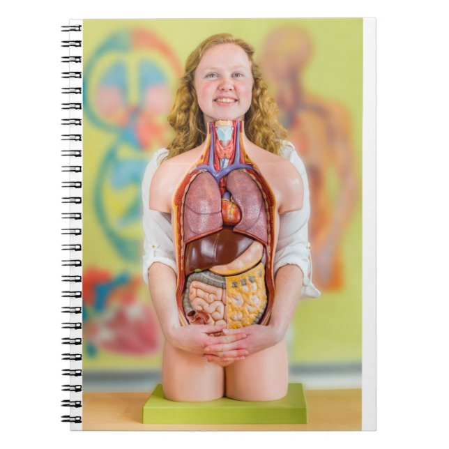 Woman holding human body with internal organs.JPG Notebook (Front)