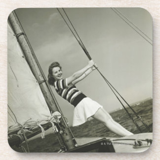 Woman Holding Rigging on Yacht Coaster