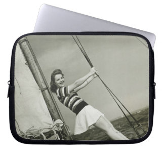 Woman Holding Rigging on Yacht Laptop Sleeve