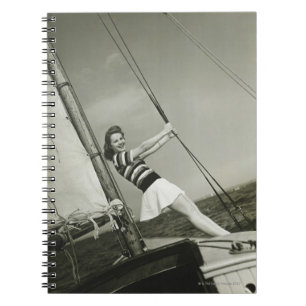 Woman Holding Rigging on Yacht Notebook