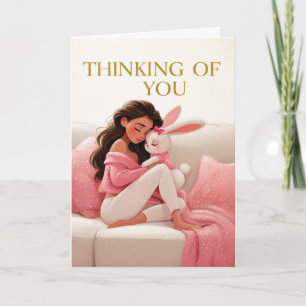 Woman Hugging Bunny on Couch Thinking of You Card
