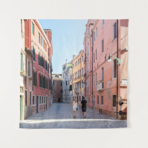 Woman in black jacket walking on sidewalk in the m tapestry
