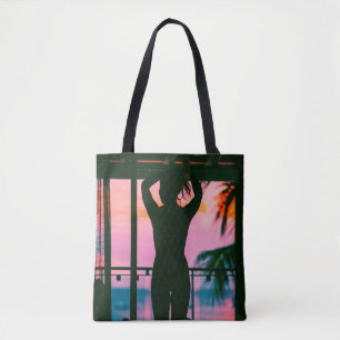 Woman in black tank top and pants standing on blac tote bag