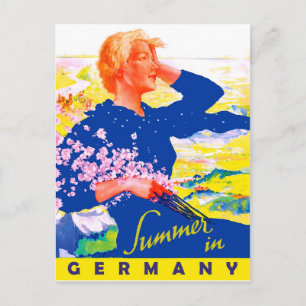 Woman in blue dress on summer field in Germany Postcard
