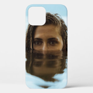 Woman in body of water in the morning iPhone 12 case