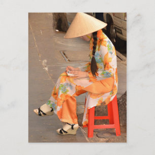Woman in Orange and Conical Hat Postcard