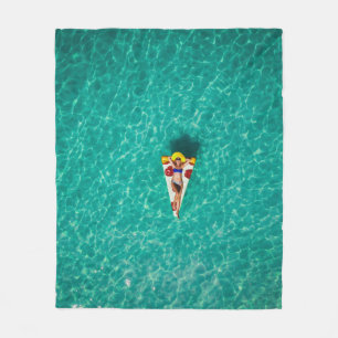 Woman in pizza float fleece blanket