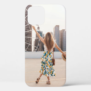 Woman in white and blue floral dress holding hat iPhone 12 case