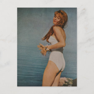 Woman in White Swimsuit on the beach in 1957  Postcard