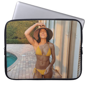 Woman in yellow bikini standing on brown brick flo laptop sleeve