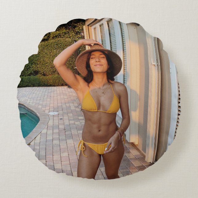 Woman in yellow bikini standing on brown brick flo round cushion (Front)
