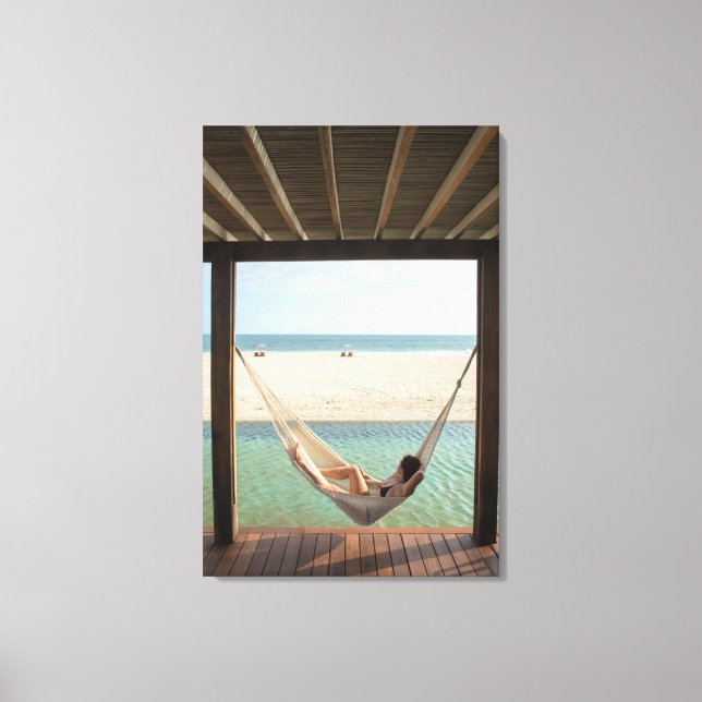 Woman Laying On A Hammock At A Small Hotel Canvas Print (Front)