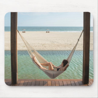Woman Laying On A Hammock At A Small Hotel Mouse Mat