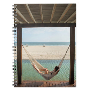 Woman Laying On A Hammock At A Small Hotel Notebook