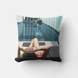 Woman laying on brown chaise lounge cushion