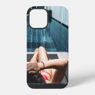Woman laying on brown chaise lounge iPhone 12 case
