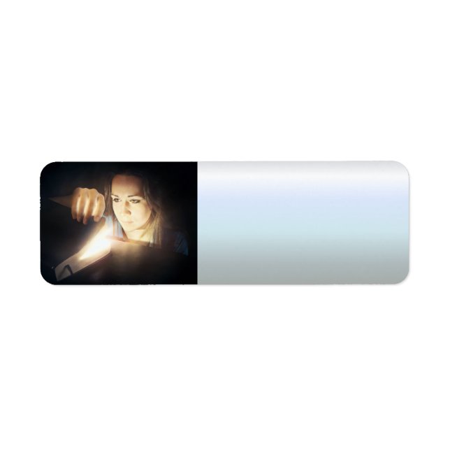 Woman Looks Inside a Glowing Book (Front)
