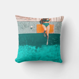 Woman lying beside swimming pool in the morning cushion