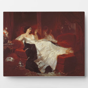 Woman on a red sofa plaque